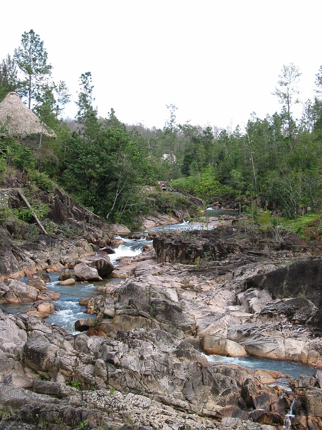 Blancaneaux Lodge. Creek. Mountain Pine Ridge. .