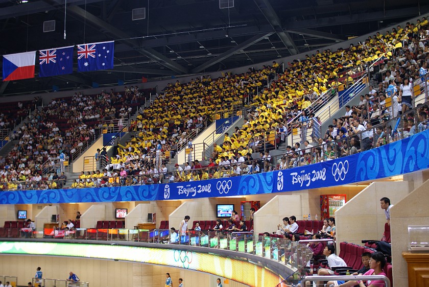 Women's Preliminary Basketball Russia vs White Russia. Organized cheerers. Beijing. .