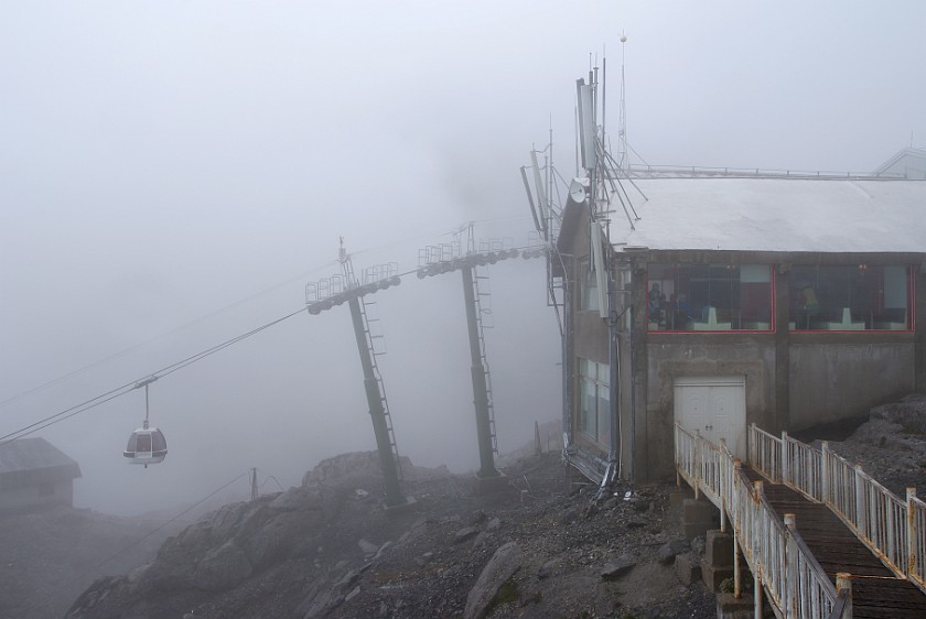 Trip to the Yùlóng Xueshan Summit. Yùlóng gondola top station. Yùlóng Xueshan. .