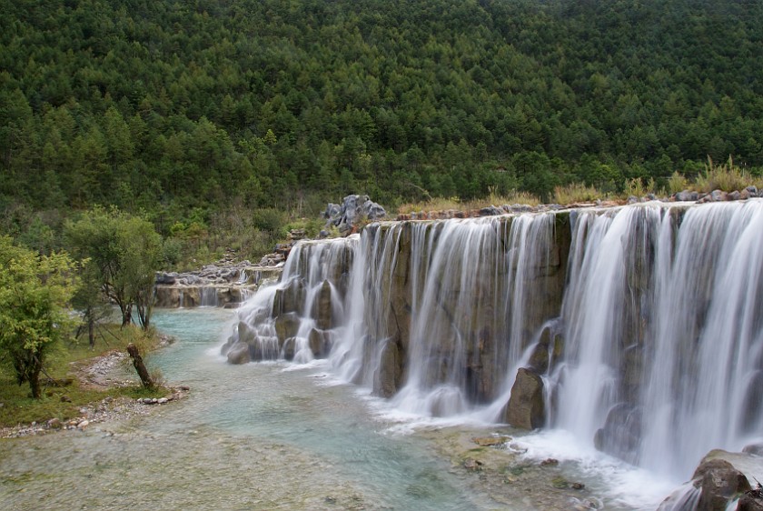 Trip to the Yùlóng Xueshan Summit. Waterfall at the base of the Yùlóng. Yùlóng Xueshan. .