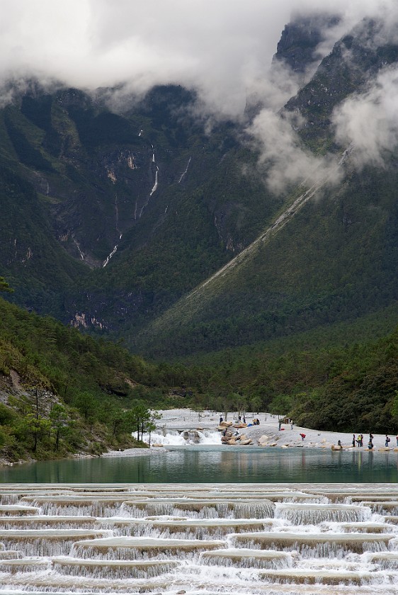 Trip to the Yùlóng Xueshan Summit. Waterfall at the base of the Yùlóng. Yùlóng Xueshan. .