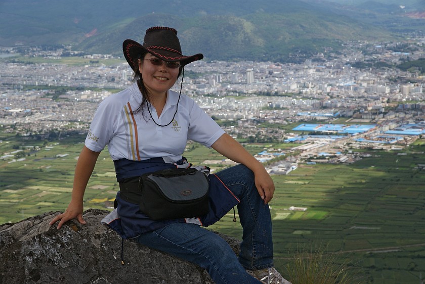 Horseback Ride on Saddle Mountain. On top of Saddle Mountain with Lìjiang in the background. Saddle Mountain. .