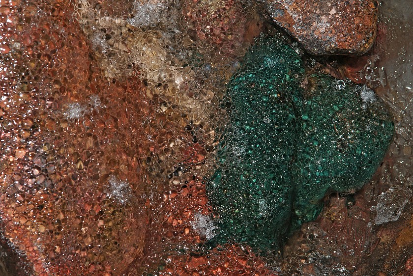 Raufarhólshellir Cave. Ice on colored ground. near Reykjavík. .