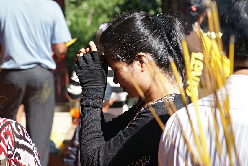 Wat Phnom. Praying Woman. Phnom Penh. .