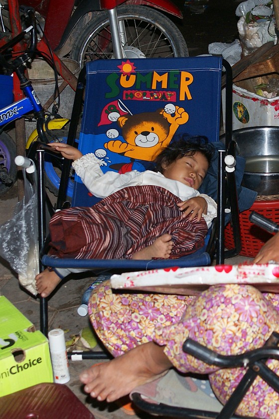 People in Cambodia. Sleeping Child. Siem Reap. .