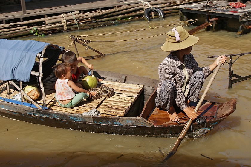 Floating Village of Chong Kneas. Children with Snake. Chong Kneas. .