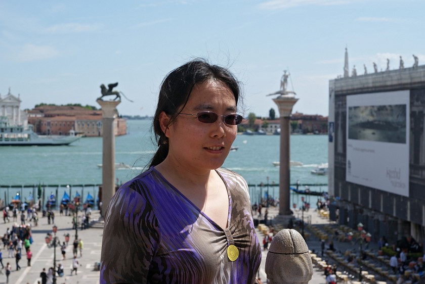Saint Mark's Square. Portrait with View on Columns with the Lion of Saint Mark and Saint Theodore. Venice. .
