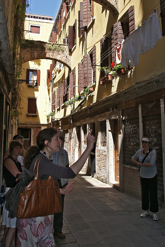 San Polo and San Marco. Guide in Narrow Street. Venice. .
