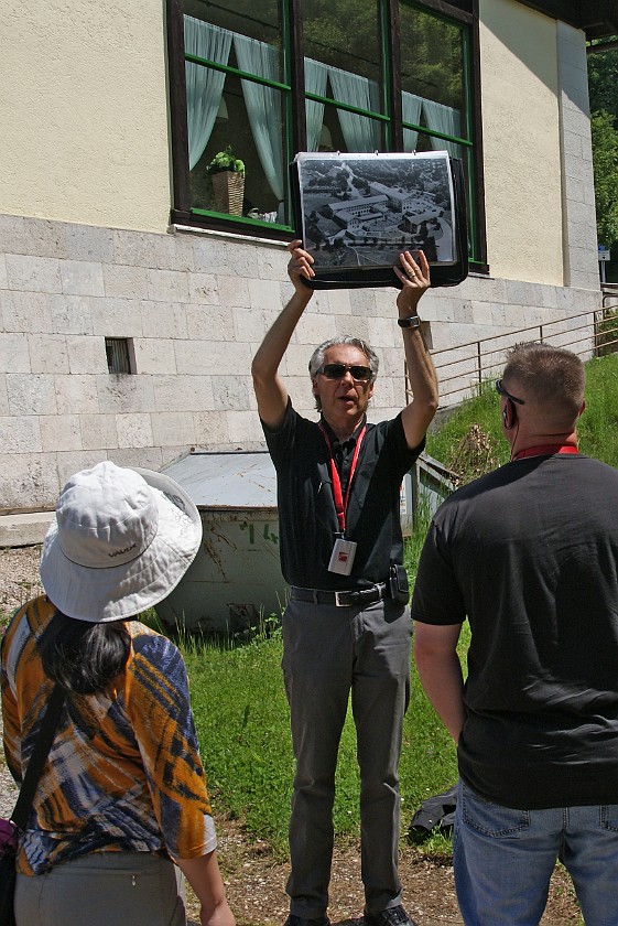 Documentation Obersalzberg. Tour Guide in Front of Former Hotel Building. Berchtesgaden. .