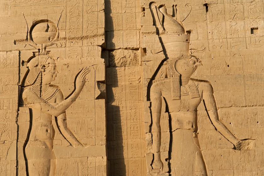 Philae Temple of Isis. Reliefs of Hathor and Ra on the second pylon. near Aswan. .