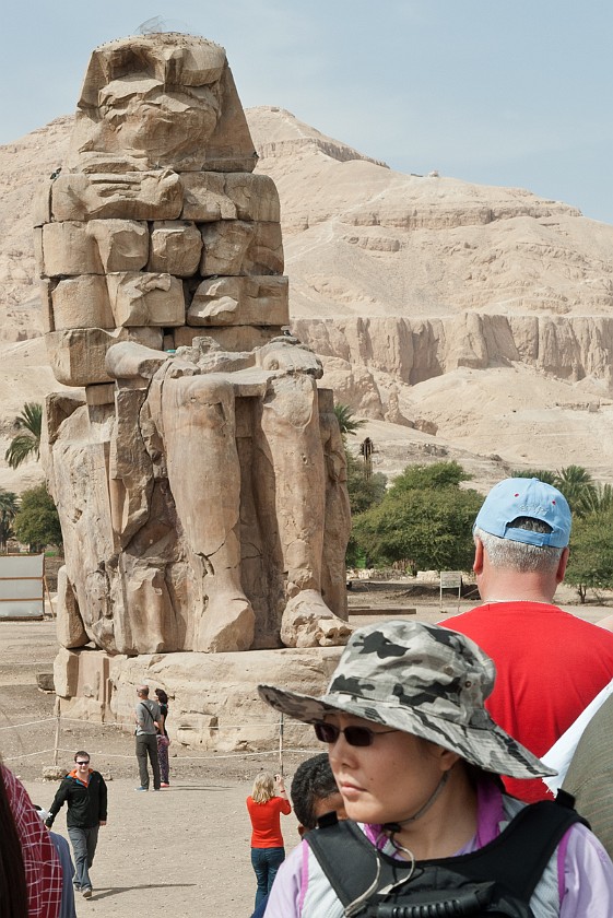 Colossi of Memnon. Portrait with statue. near Luxor. .