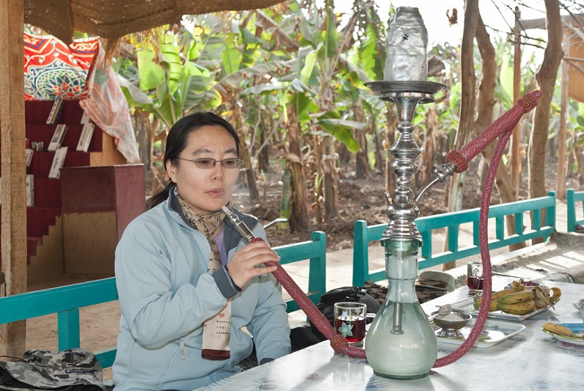 Banana Island. Portrait while smoking a waterpipe (sheesha). Luxor. .