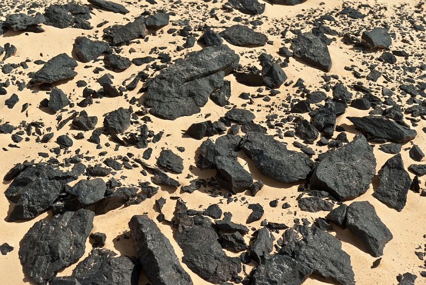Black Desert Safari. Basalt stone and desert sand. near the Baharyia Oasis. .