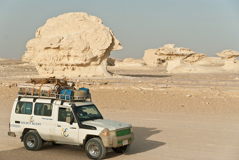White Desert Safari. AWD vehicle and rock formations. near Qasr al-Farafra. .