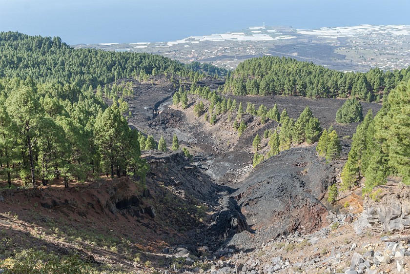 Ruta de los Volcanes. View onto a lava flow and the west coast. near Puerto de Naos. .