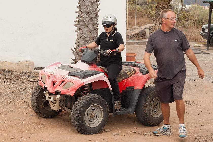 Quad Driving. Portrait with owner and quad. Arona. .