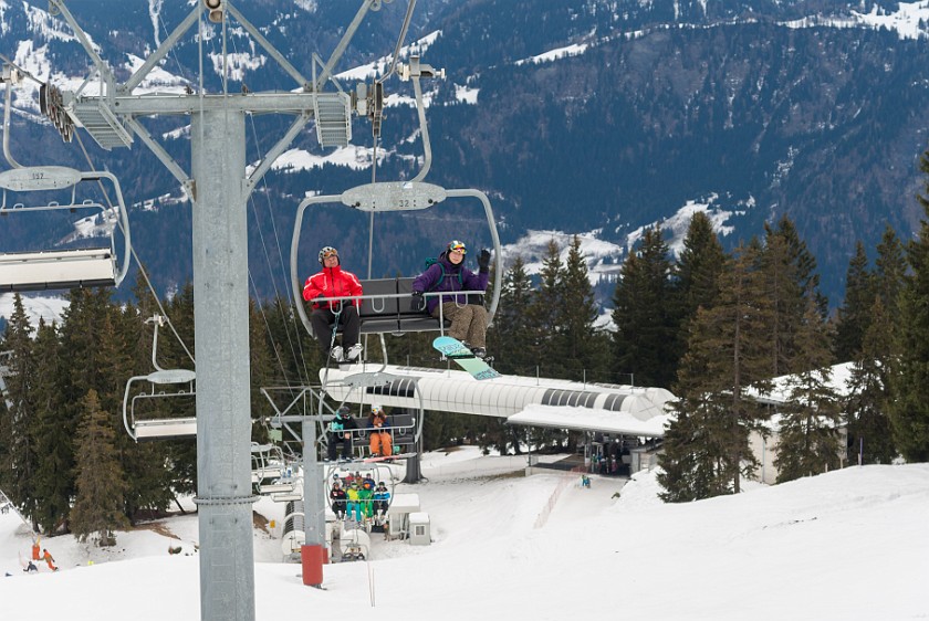 Skiing at Flims-Laax. Friend on the chair lift. Flims. .