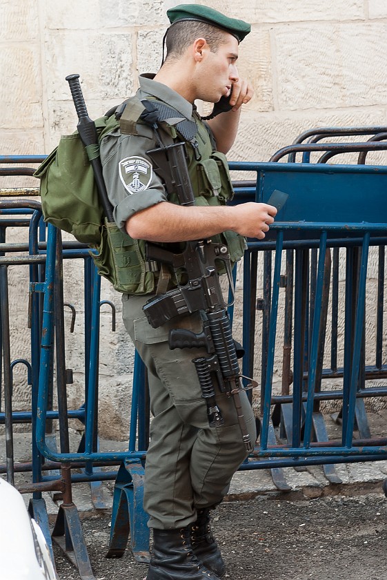 Old City of Jerusalem. Soldier at the western end of the Via Dolorosa. Jerusalem. .