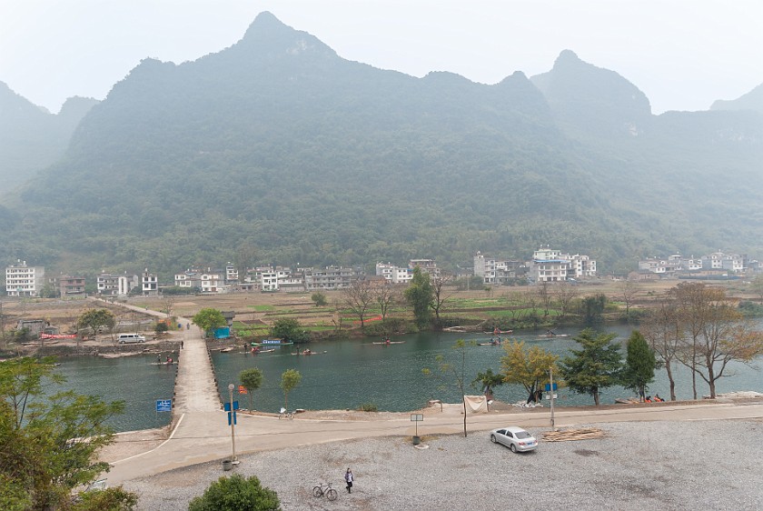 Bicycle Tour Along the Yùlóng Hé River. Yùlóng Hé scenic area and Shànguì bridge. Yángshuò. .