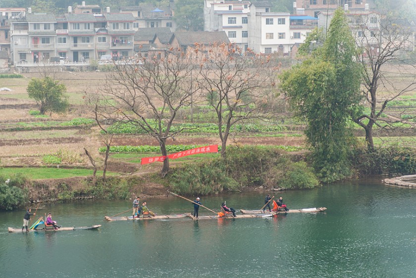 Bicycle Tour Along the Yùlóng Hé River. Tourist rafts at the Yùlóng Hé scenic area. Yángshuò. .