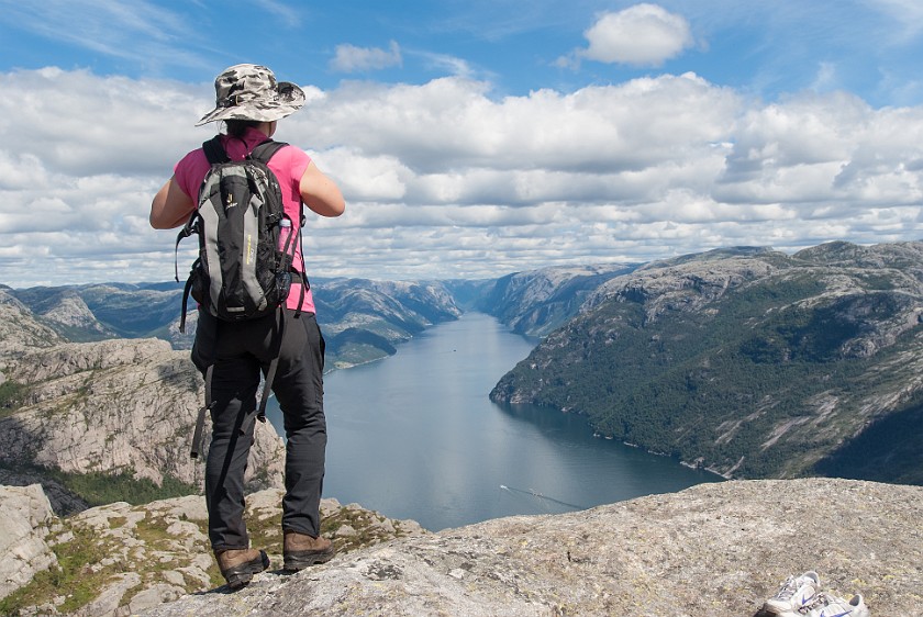 Hike to the Preikestolen. Portrait at the Preikestolen plateau with view onto the fjord. near Jorpeland. .
