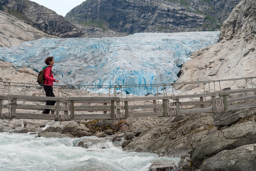 Nigardsbreen Glacier. Suspension bridge over the glacier river. near Gjerde. .