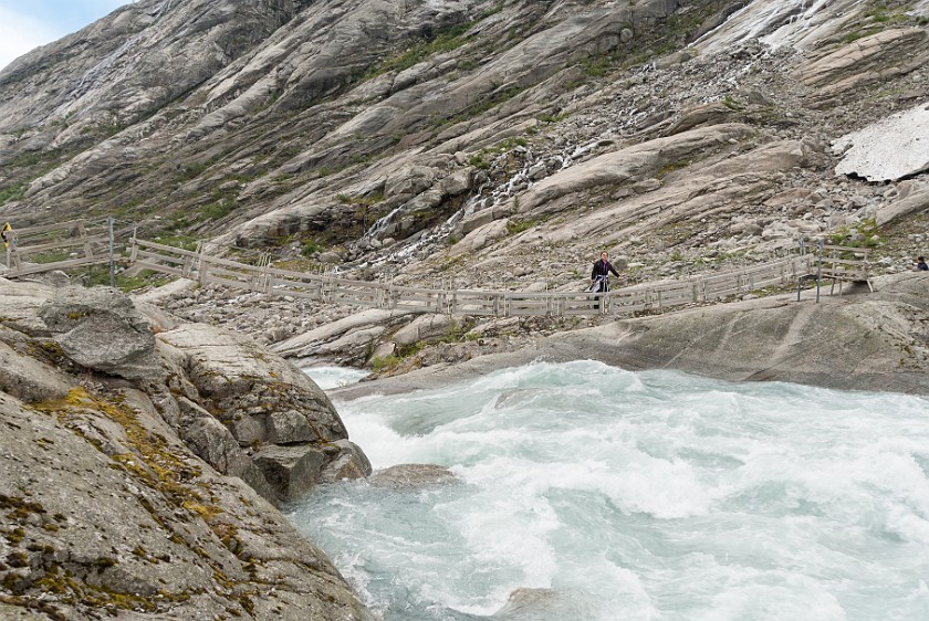 Nigardsbreen Glacier. Suspension bridge over the glacier river. near Gjerde. .