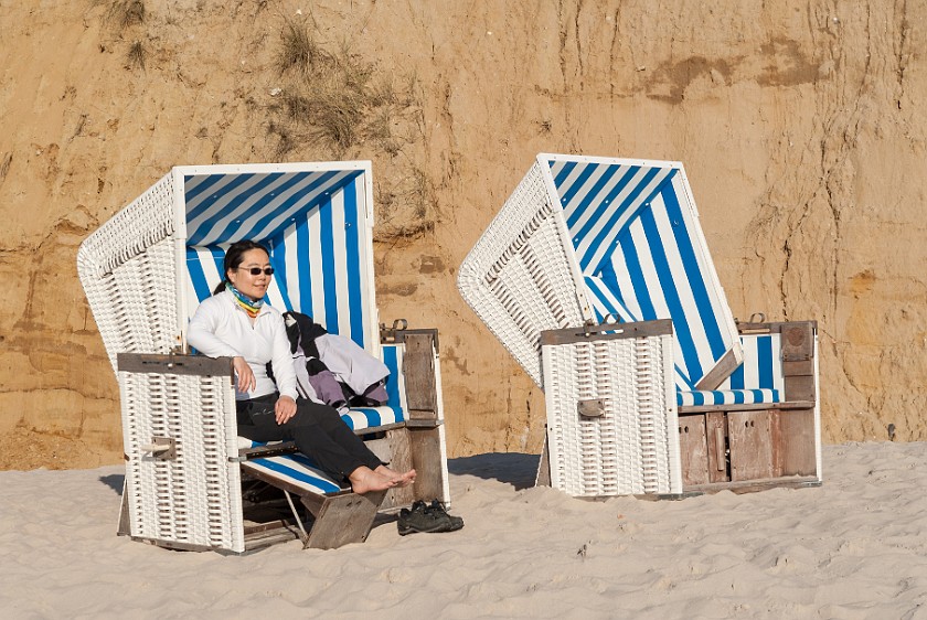 Northern Sylt. Beach chair at the red cliff. Kampen. .