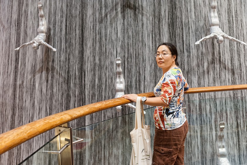 Dubai Mall. Portrait at the indoor waterfall. Dubai. .