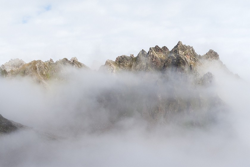 Hike to Bielerhöhe. Kleinlitzner in the mist. near Partenen. .