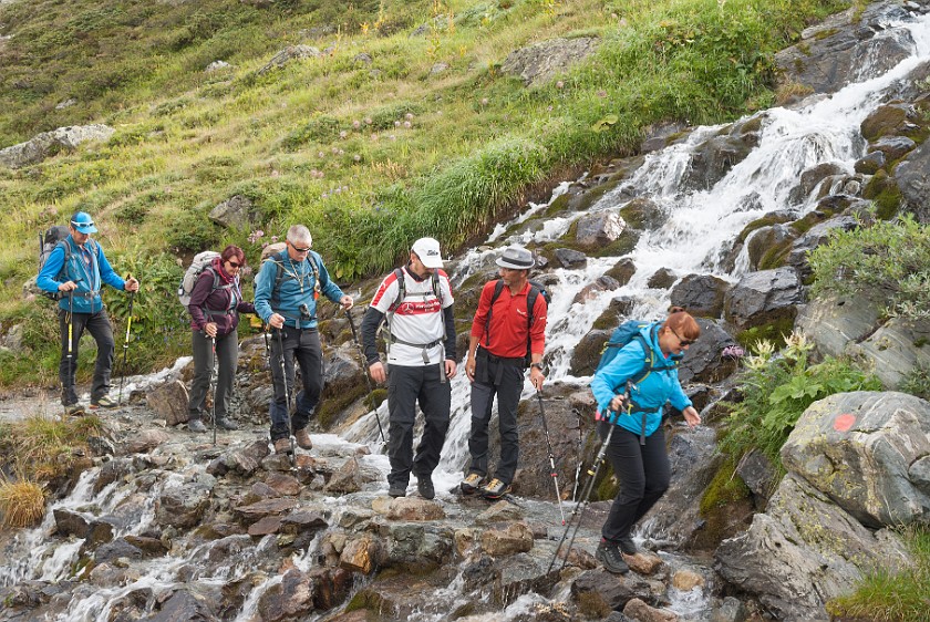 Jamtal Glacier Tour. Crossing the Jam brook. near Galtür. .