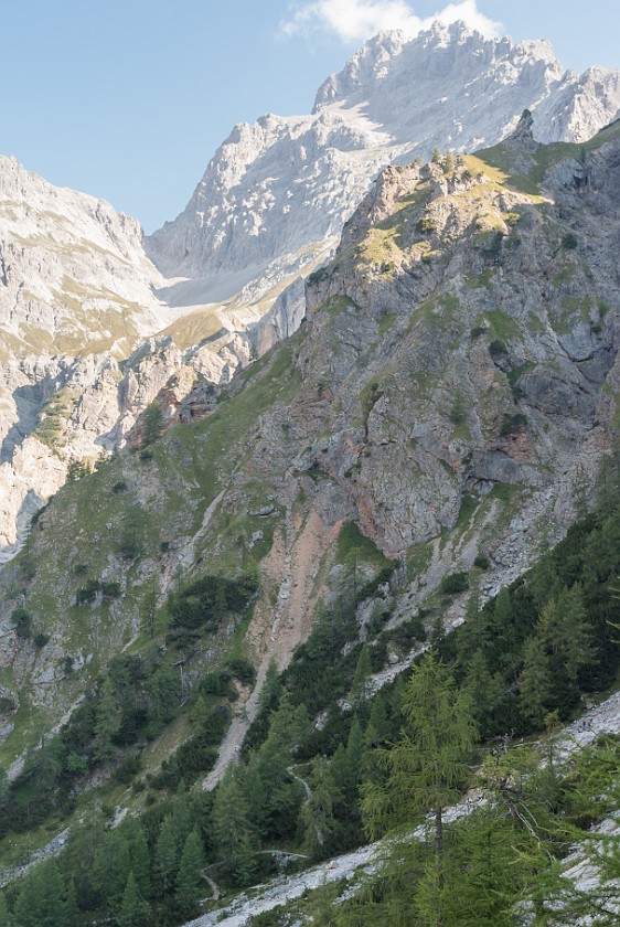 Hike to the Ingolstädter Haus. Hiking path up to the Trischübelalm with Watzmann south summit in the background. near Berchtesgaden. .