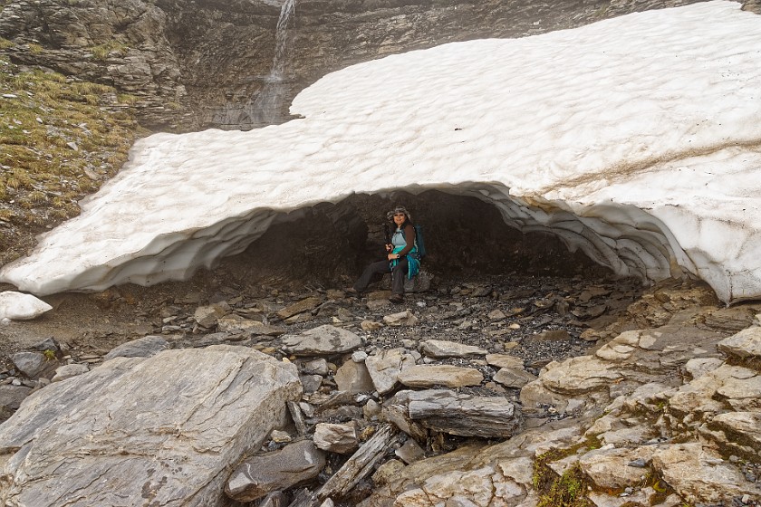 Eiger Trail . Snowfield over a brook. near Grindelwald. .
