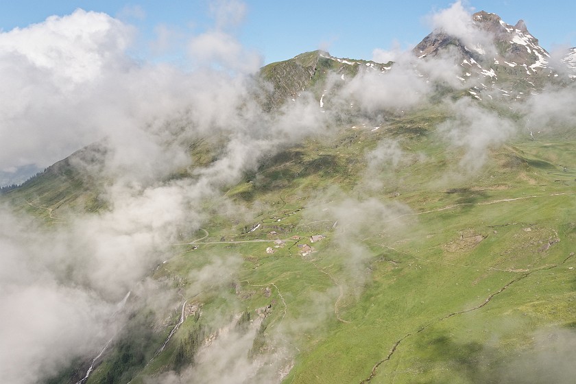 Grindelwald–First. View on the Milibach and Bachläger waterfall. near Grindelwald. .