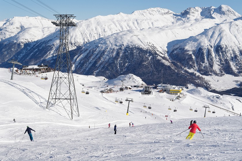 Skiing at the Corviglia. View on the Corviglia station. Sankt Moritz. .