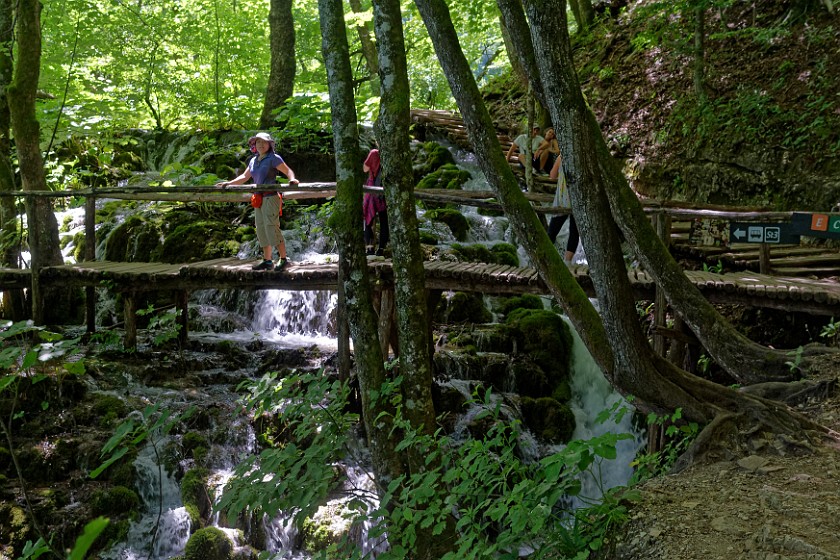 Plitvice Lakes National Park. Footbridge over waterfalls in the forest. Rastovača. .