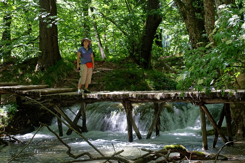 Plitvice Lakes National Park. Footbridge over waterfalls in the forest. Rastovača. .