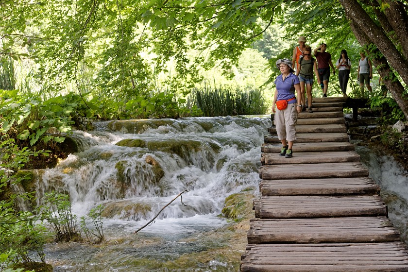 Plitvice Lakes National Park. Footbridge over waterfalls in the forest. Rastovača. .