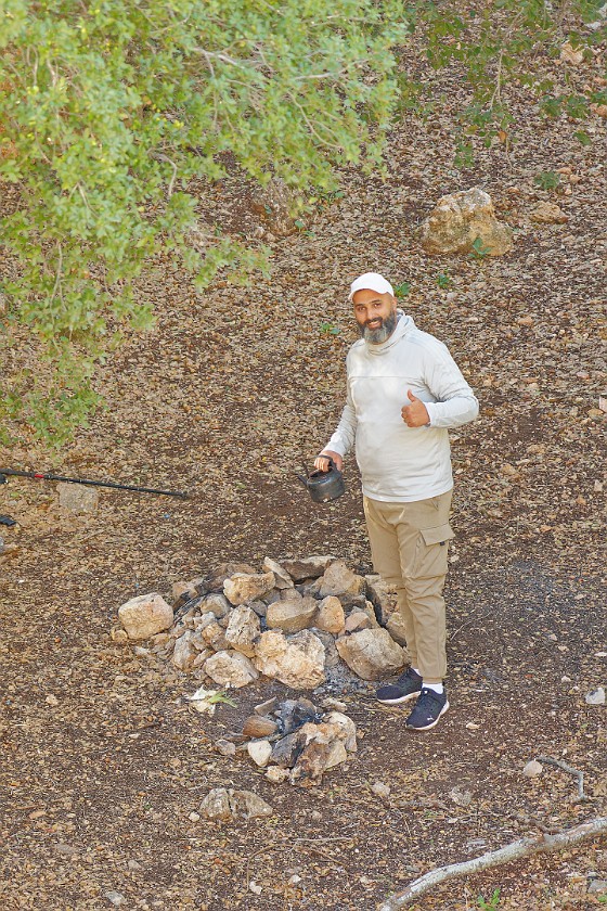 Ajloun Forest Reserve. Guide at the fire place. near Ajloun. .