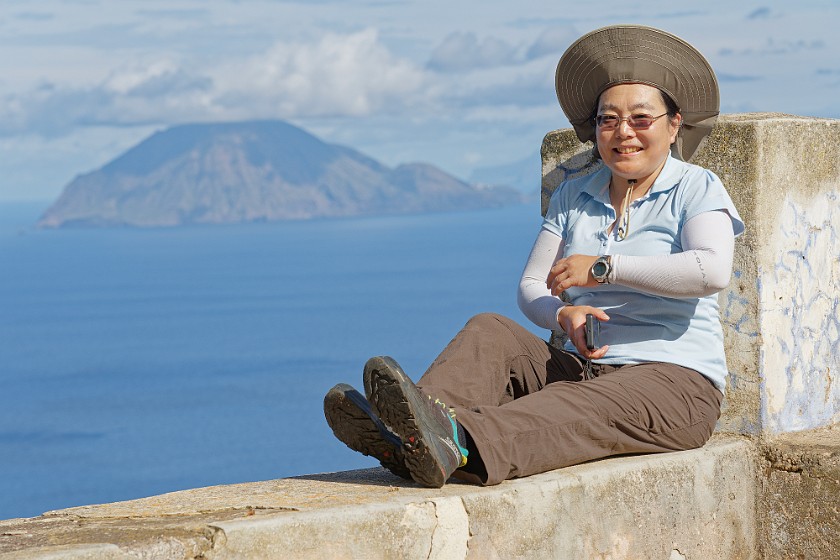 Hiking on Alicudi. Portrait with Filicudi in the background. Alicudi. .