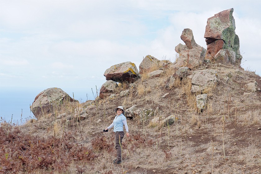 Hiking on Alicudi. Portrait on top of a cliff. Alicudi. .