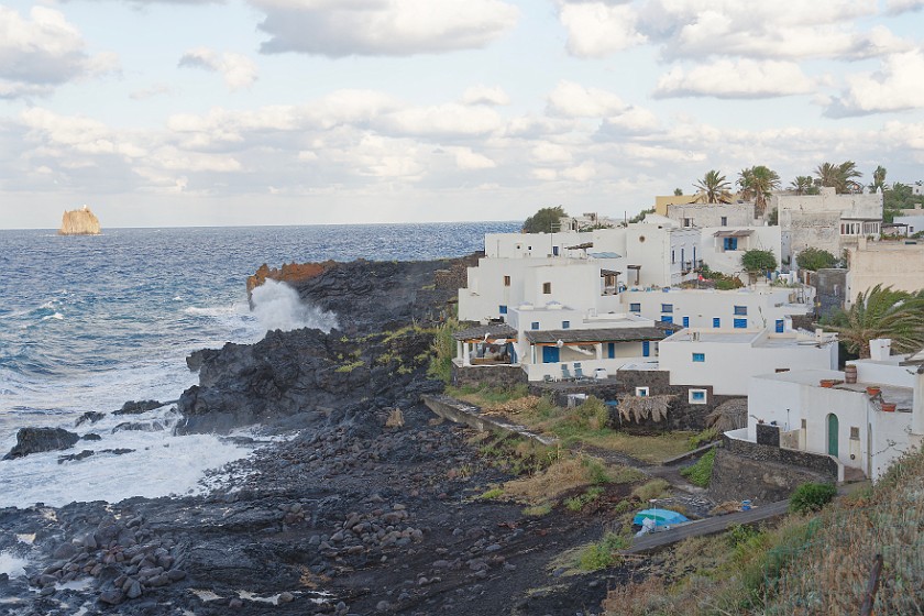 Stromboli. Coastline and Strombolicchio in the storm. Stromboli. .