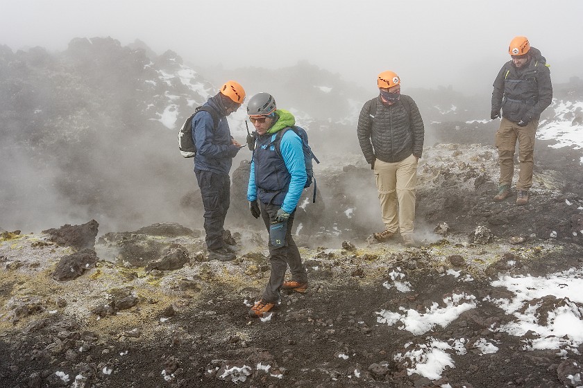 Hiking in the Etna North Area. Tour group walking on fumaroles. Linguaglossa. .