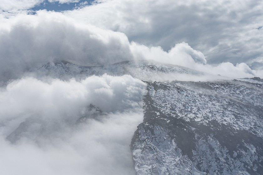 Hiking in the Etna North Area. Crater rim in the storm. Linguaglossa. .