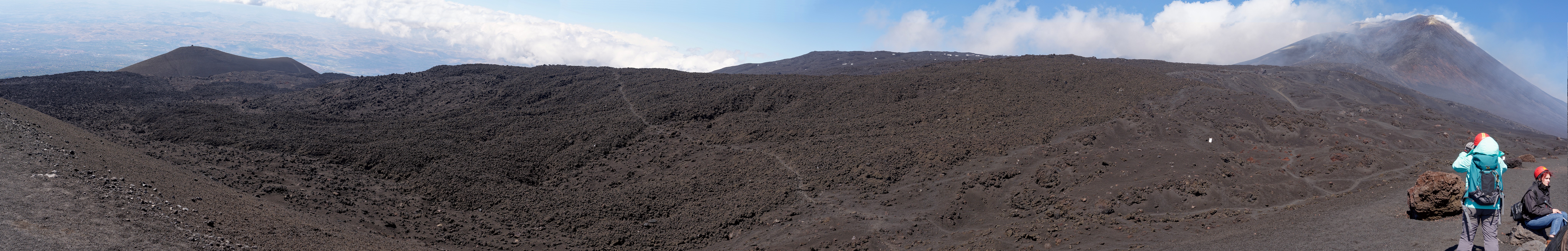 Hiking in the Etna South Area. Panoramic view on a lava field. Nicolosi. .