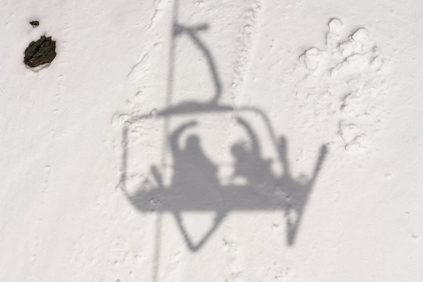 Skiing in Sulden at the Ortler. Shadow of the chairlift. Sulden. .
