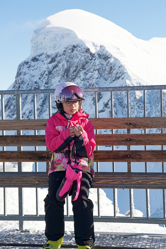 Klein Matterhorn. Daugther in front of the Breithorn. near Zermatt. .