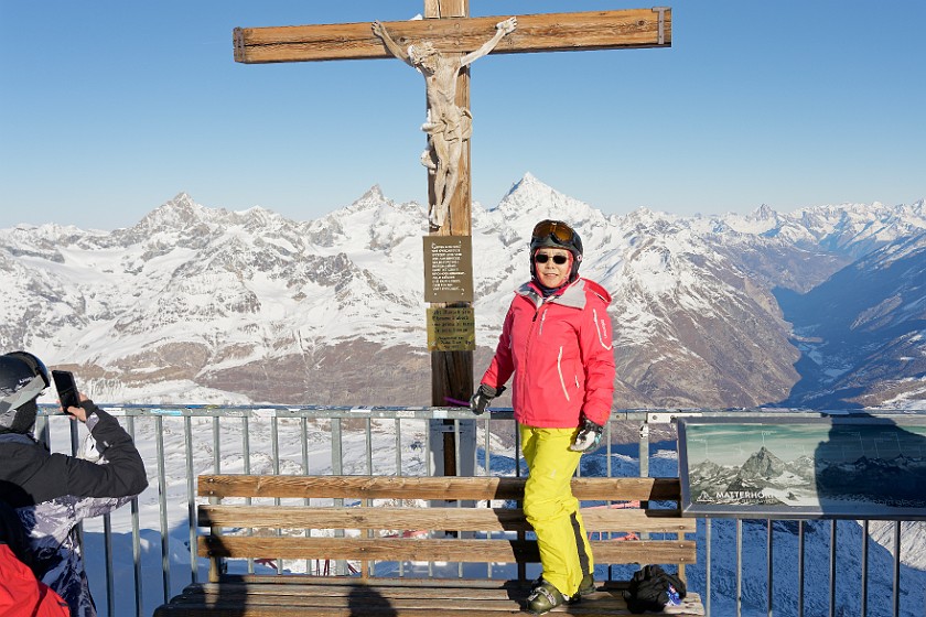 Klein Matterhorn. Portrait at the summit cross. near Zermatt. .
